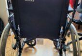 Silla de ruedas plegable de segunda mano + cojín antiescaras
