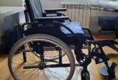 Silla de ruedas plegable de segunda mano + cojín antiescaras